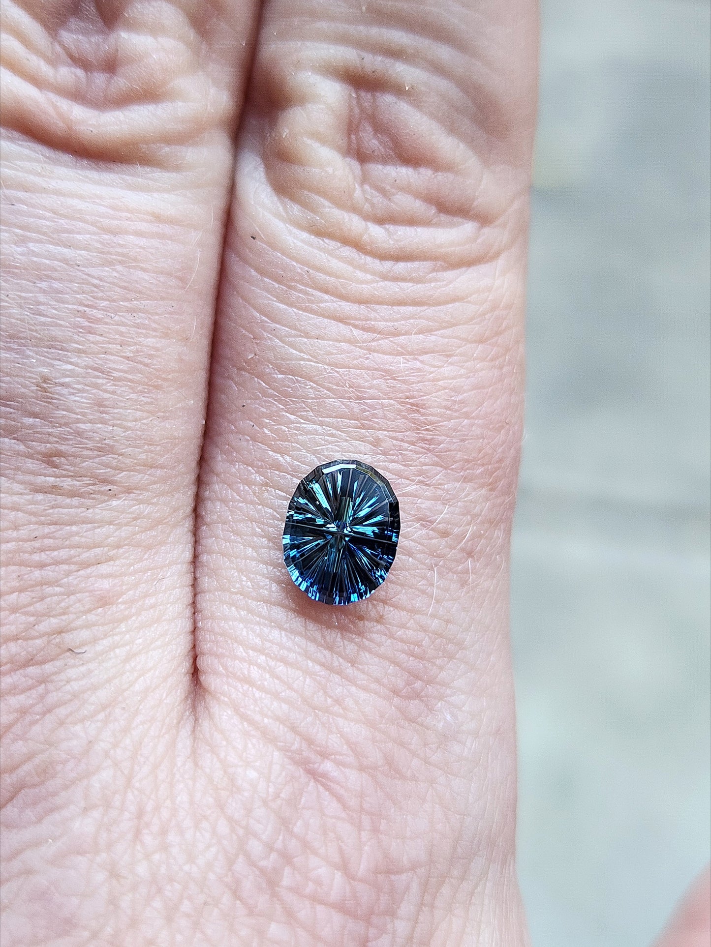 1.26ct Natural Oval Parti Color Australian Sapphire - StarBrite Cut by John Dyer