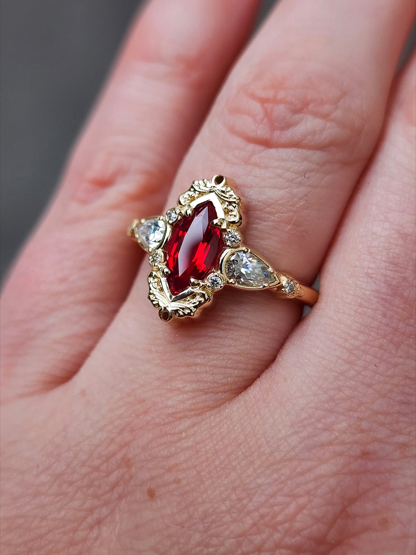 Chatham Ruby Marquise Odette ring fairytale wedding ring details filigree pear diamond sides 14k gold made in portland oregon artisan jewelry 