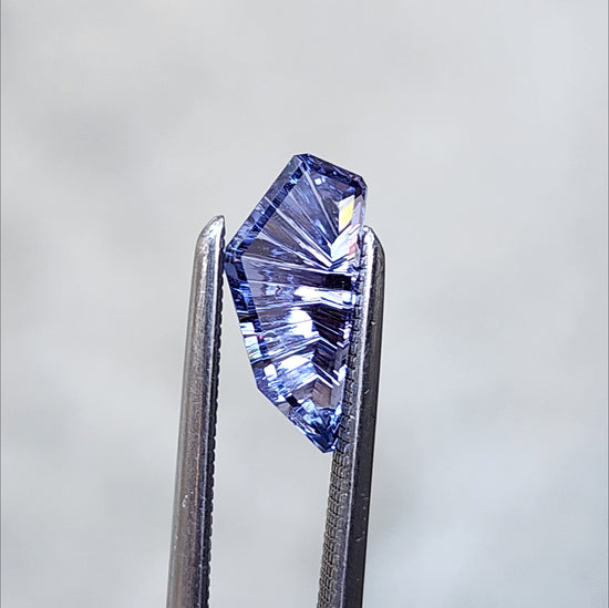 .88ct freeform dreamscape cut sapphire by john dyer