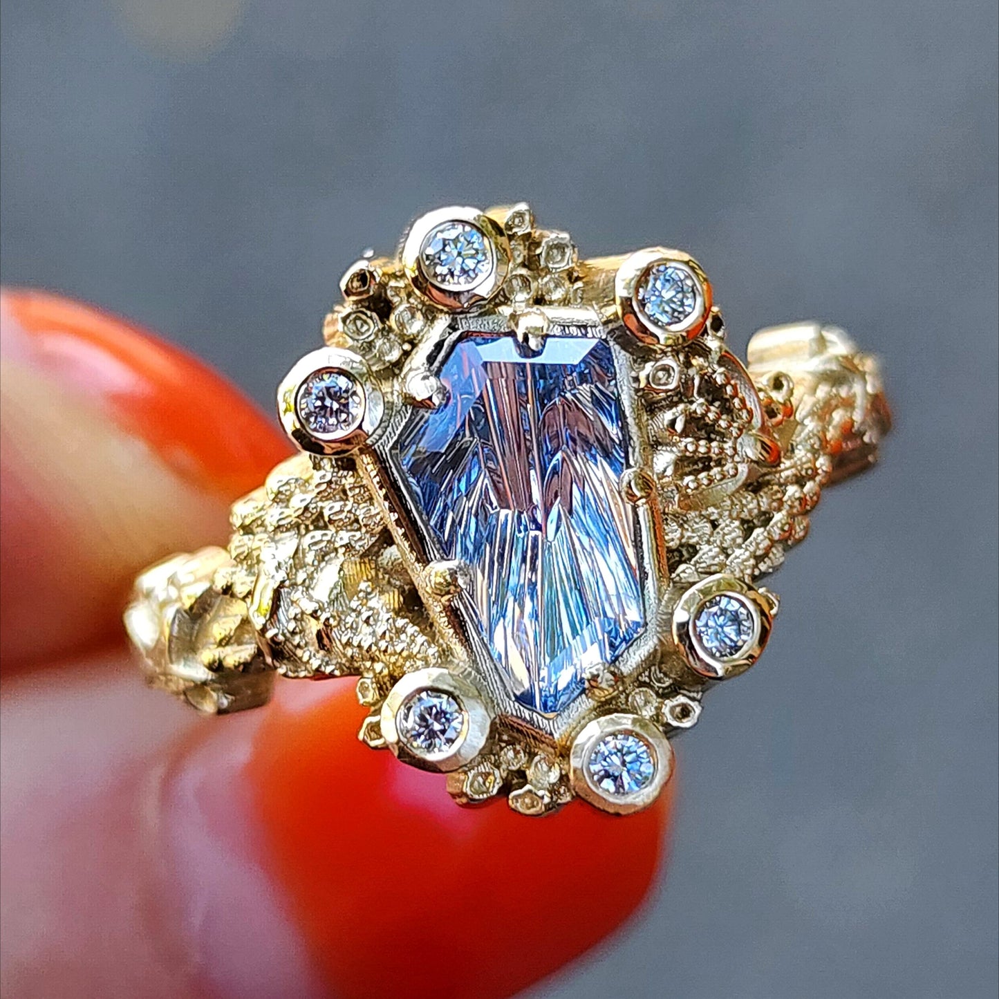 Siren Engagement Ring with a Blue Sapphire Fancy Cut - Seashells Barnacles, Diamonds, 14k yellow gold