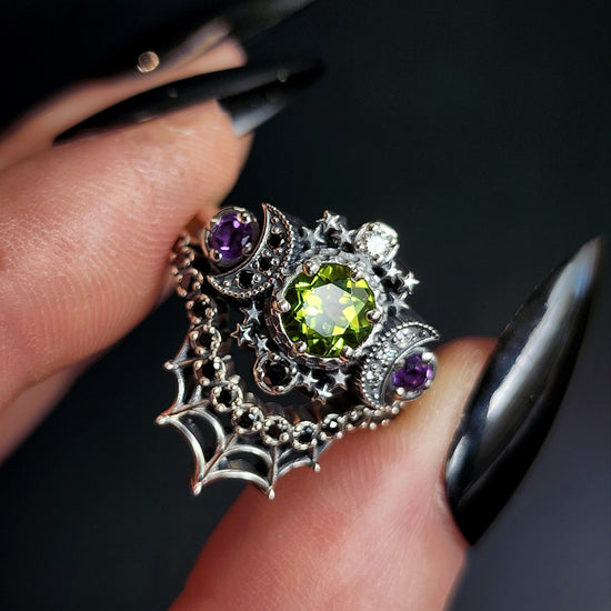 sterling silver cosmos with peridot and amethyst for ghost drawlloween black and white diamonds goth occult jewelry 