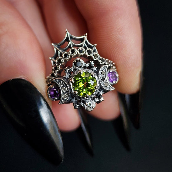 sterling silver cosmos with peridot and amethyst for ghost drawlloween black and white diamonds goth occult jewelry 