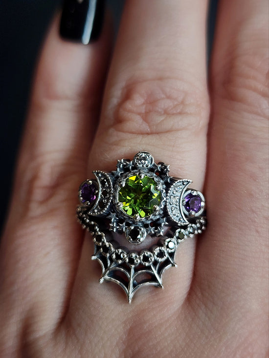 sterling silver cosmos with peridot and amethyst for ghost drawlloween black and white diamonds goth occult jewelry 