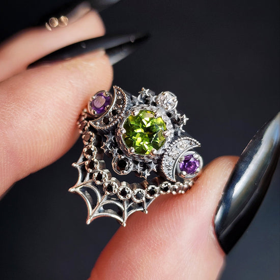 sterling silver cosmos with peridot and amethyst for ghost drawlloween black and white diamonds goth occult jewelry 