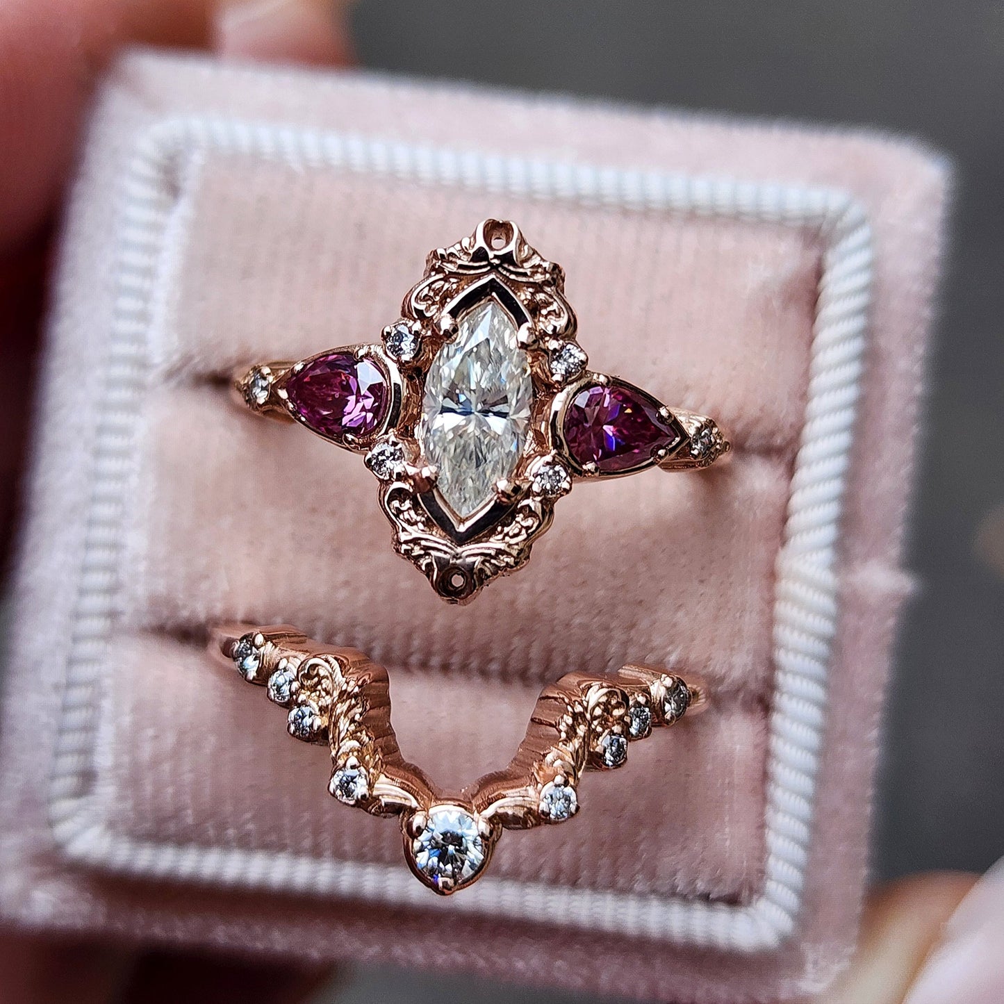 elvish marquise engagement ring with gold details and pink moissanite pears and curved diamond wedding band custom engagement ring set fantasy fairytale jewelry 