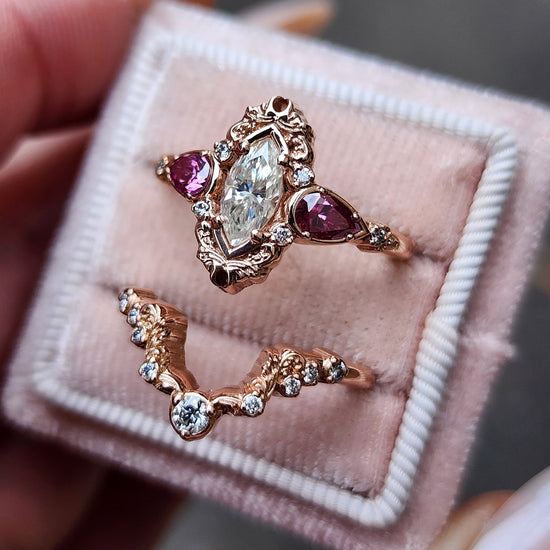 elvish marquise engagement ring with gold details and pink moissanite pears and curved diamond wedding band custom engagement ring set fantasy fairytale jewelry 