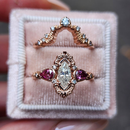 elvish marquise engagement ring with gold details and pink moissanite pears and curved diamond wedding band custom engagement ring set fantasy fairytale jewelry 