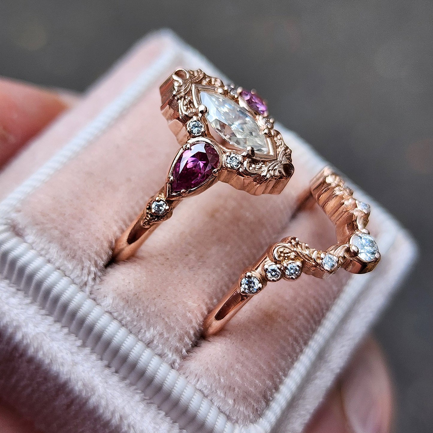 elvish marquise engagement ring with gold details and pink moissanite pears and curved diamond wedding band custom engagement ring set fantasy fairytale jewelry 