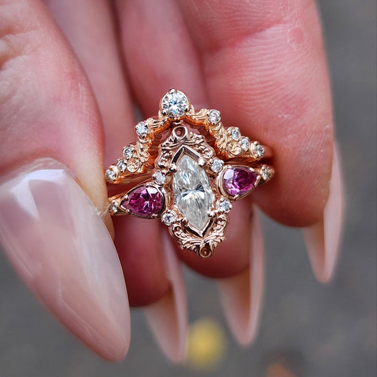 elvish marquise engagement ring with gold details and pink moissanite pears and curved diamond wedding band custom engagement ring set fantasy fairytale jewelry 