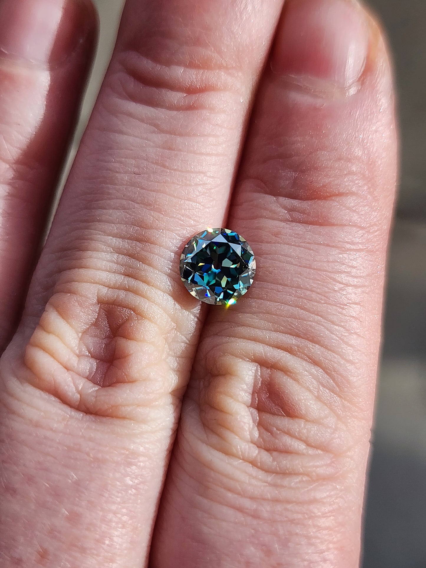 1.41ct old european cut teal moissanite round cut