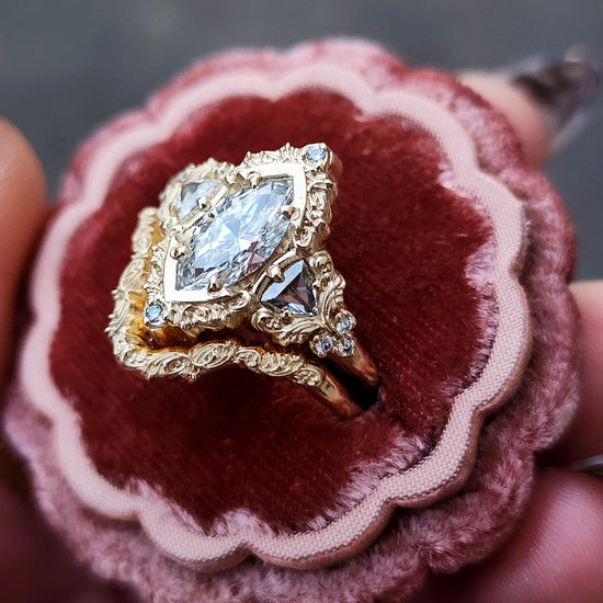 delilah engagement ring with marquise center stone and trillion side stones build your own custom ring 