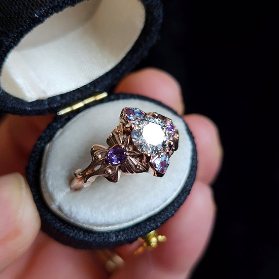 Luna Moth engagement ring with lab diamond purple sapphires and alexandrite 14k rose gold