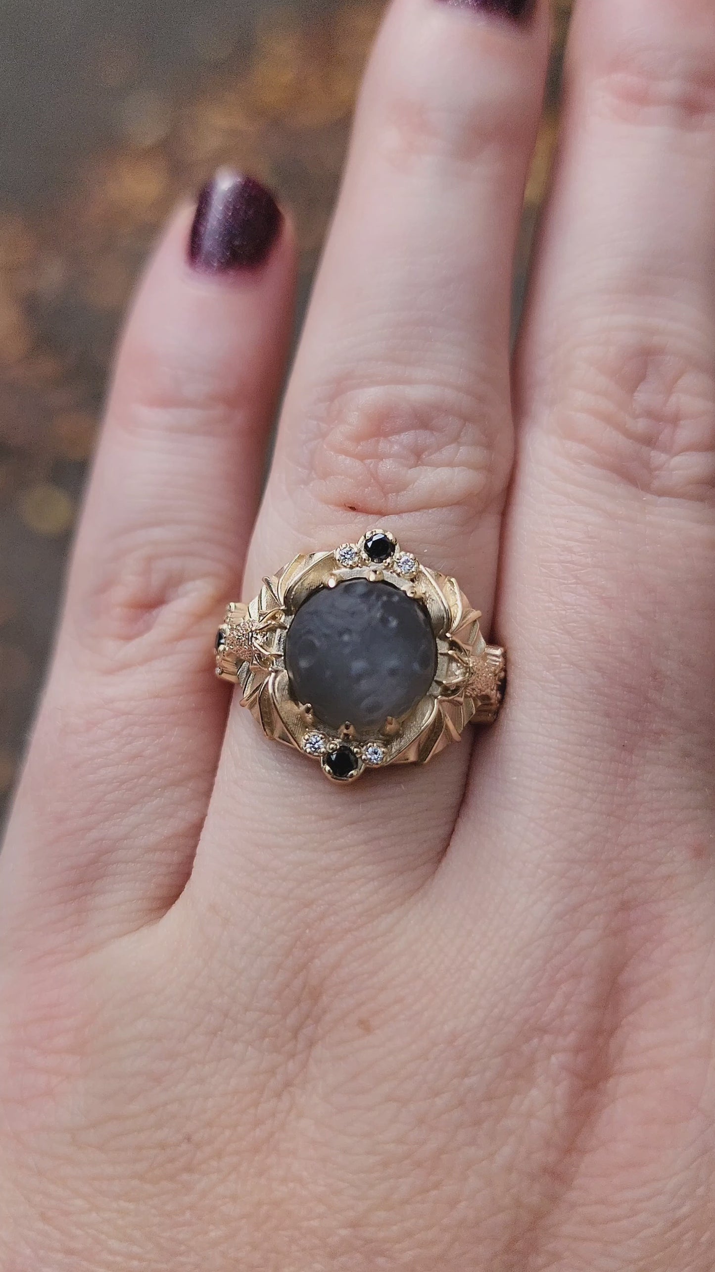 Load and play video in Gallery viewer, Keepers of the Moon ring by SwankMetalsmithing with hand carved gray moonstone moon and gold vampire bats
