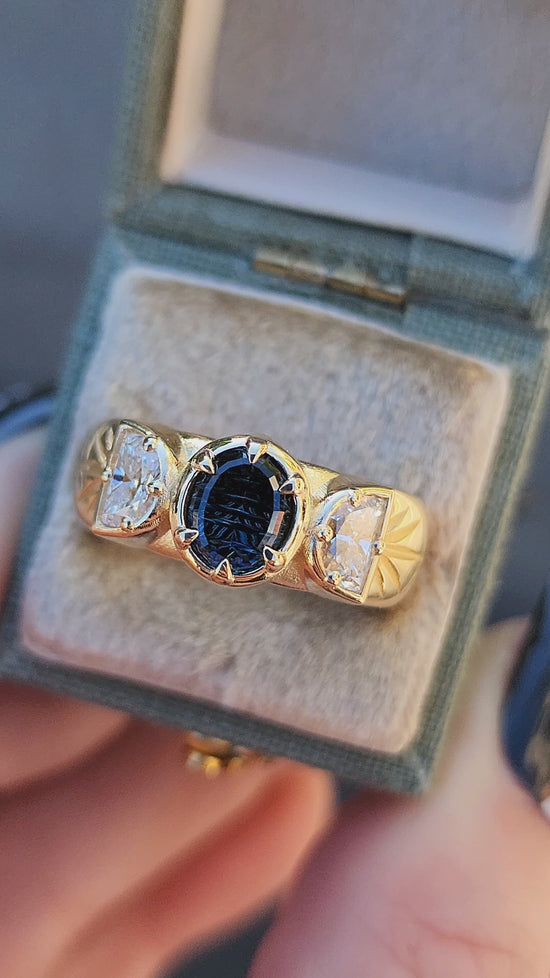 Load and play video in Gallery viewer, Triple moon witch wide band gold ring with engraved rays and oval teal concave cut sapphire by john dyer with lab diamond half moons 14k yellow gold by swankmetalsmithing fine engagement ring jewelry 
