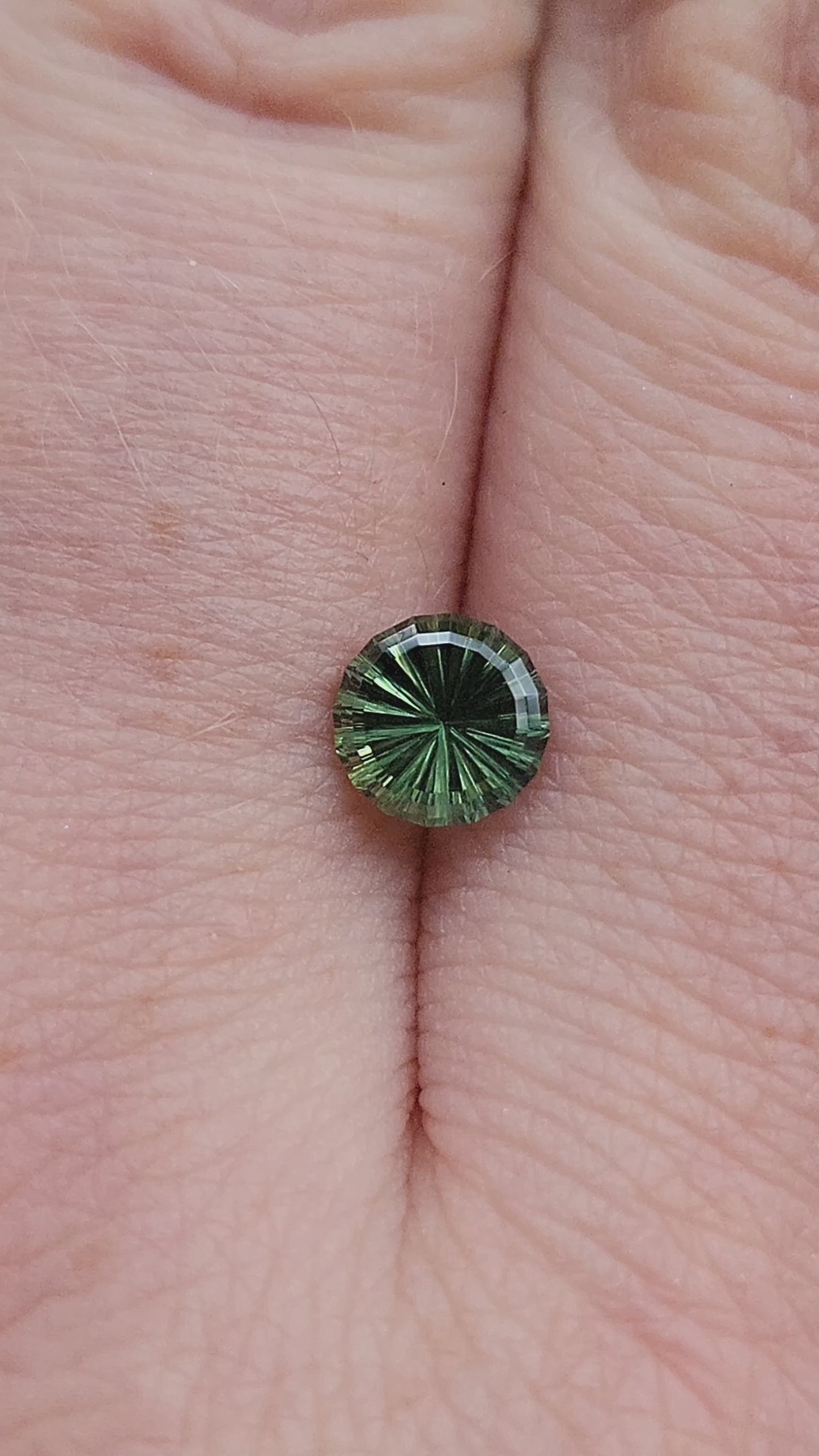 Load and play video in Gallery viewer, .96ct Natural Green Australian Sapphire Round Deep Concave Cut - by John Dyer
