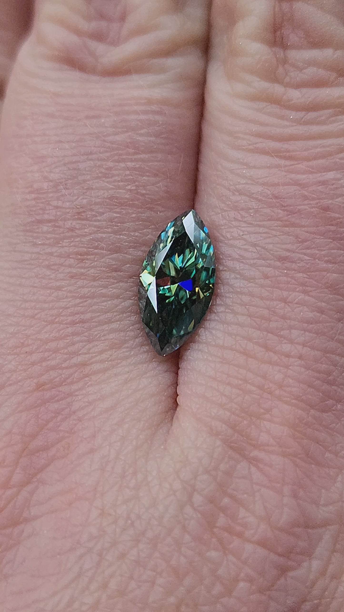 Load and play video in Gallery viewer, 1.73ct Deep Green Moissanite Marquise
