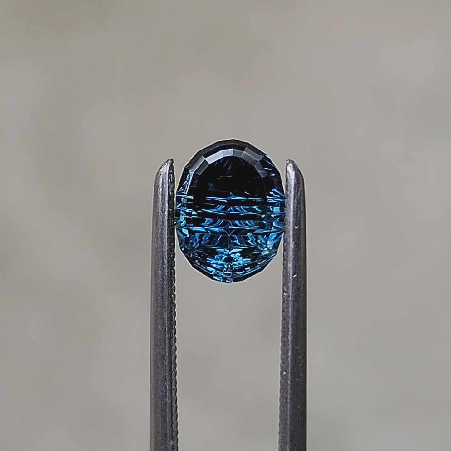 Load and play video in Gallery viewer, 1.06ct Natural Teal Australian Sapphire Oval Deep Concave Cut - by John Dyer
