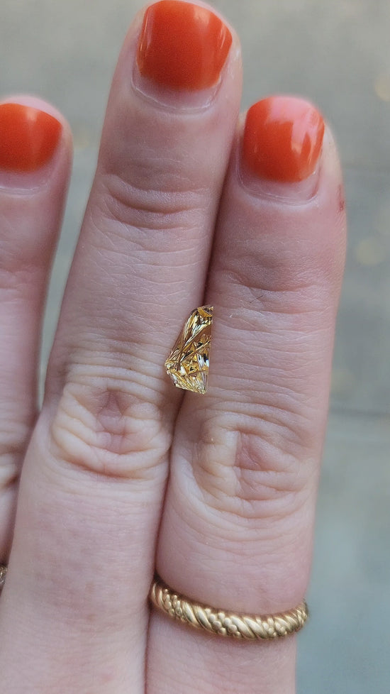 Load and play video in Gallery viewer, .85ct Montana yellow sapphire freeform dreamscape cut
