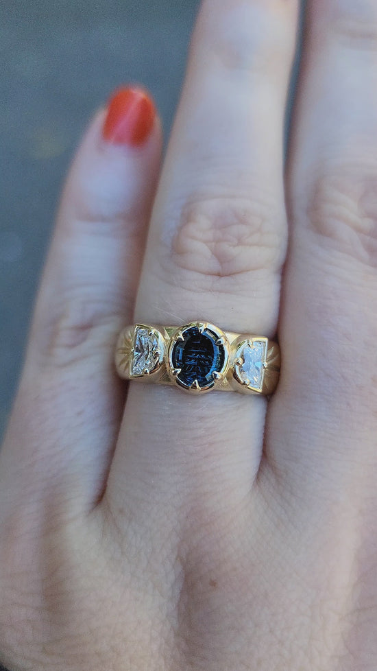 Load and play video in Gallery viewer, Triple moon witch wide band gold ring with engraved rays and oval teal concave cut sapphire by john dyer with lab diamond half moons 14k yellow gold by swankmetalsmithing fine engagement ring jewelry 
