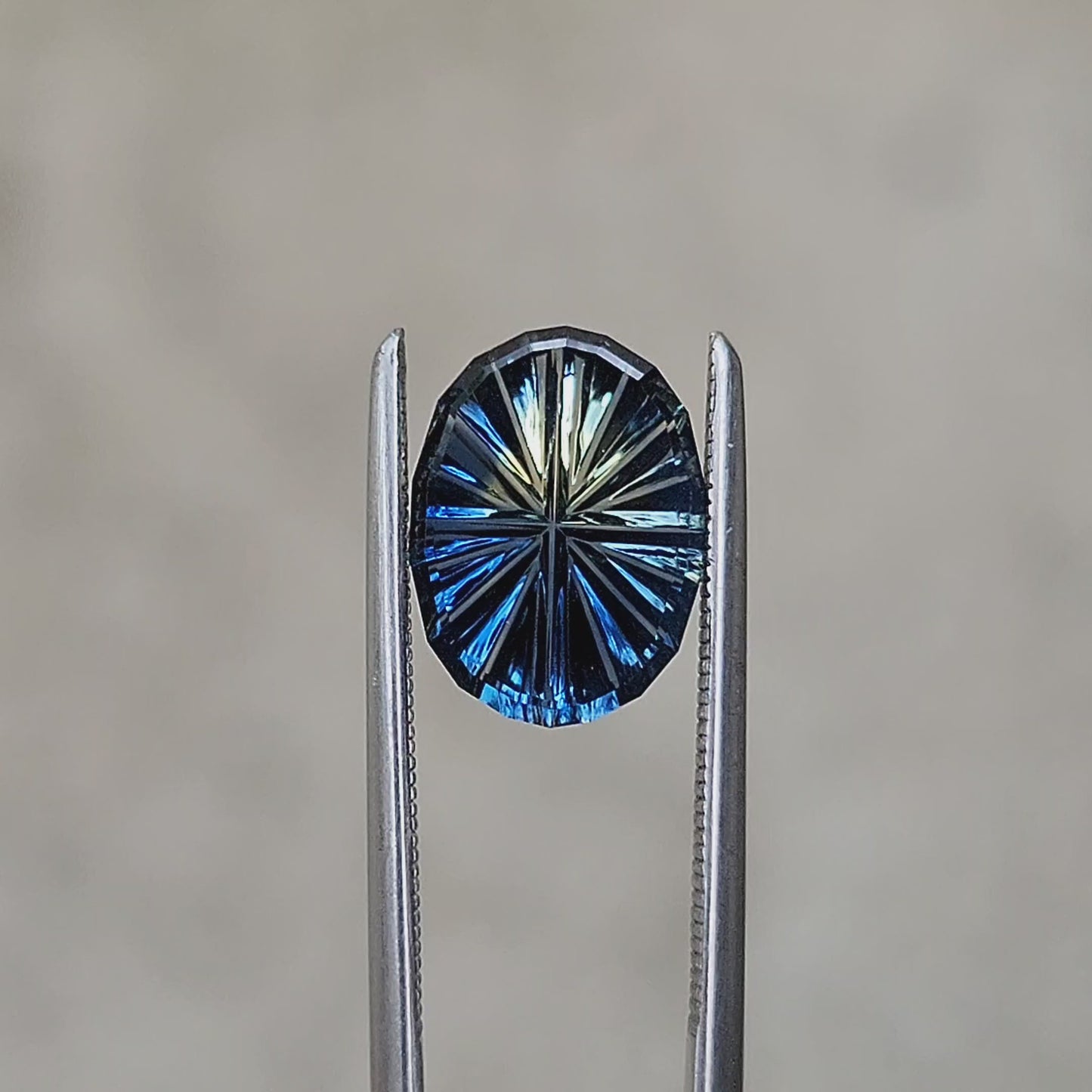 Load and play video in Gallery viewer, 2.15ct Natural Parti Australian Sapphire Oval - Starbrite Cut by John Dyer
