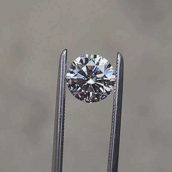 Load and play video in Gallery viewer, .86ct D/VS2 round brilliant lab diamond loose for build your own ring
