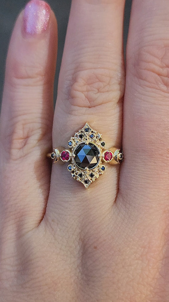 Load and play video in Gallery viewer, Ready to Ship Size 6-8 Rose Cut Black Diamond Galaxie Lunar Engagement Ring with Chatham Rubies - 14k Yellow Gold
