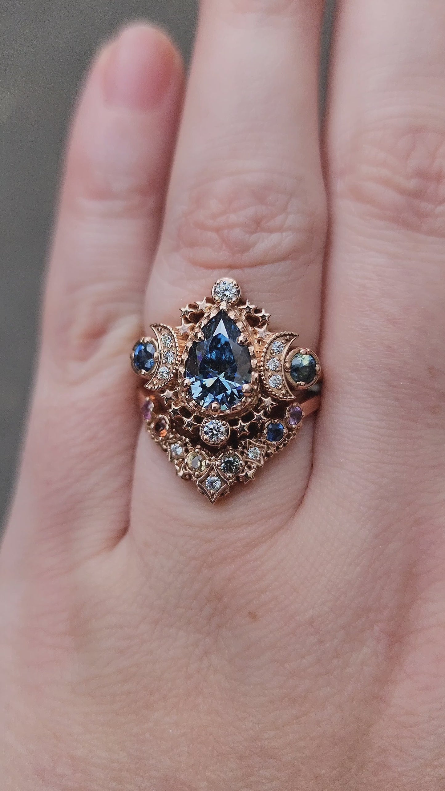 Load and play video in Gallery viewer, 14k rose gold pear cosmos with blue green sapphires and rainbow stardust chevron wedding band celestial ready to ship ring size 5 6 
