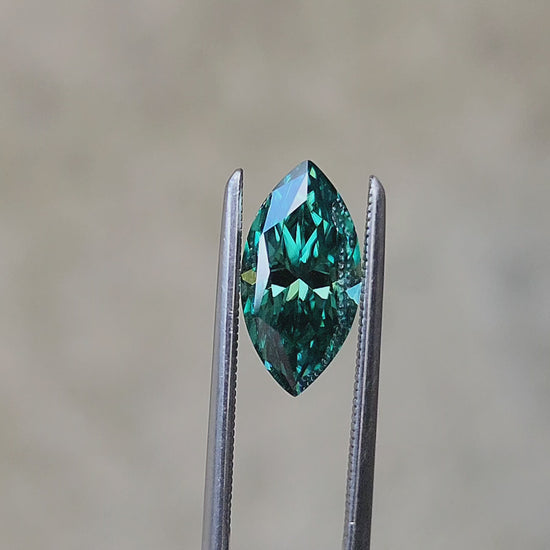 Load and play video in Gallery viewer, 1.86ct Deep Green Moissanite Marquise
