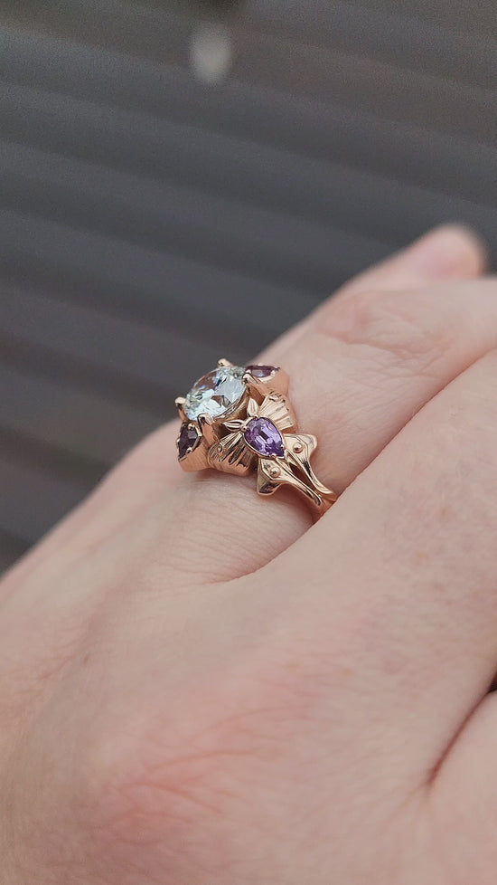 Load and play video in Gallery viewer, Luna Moth engagement ring with lab diamond purple sapphires and alexandrite 14k rose gold
