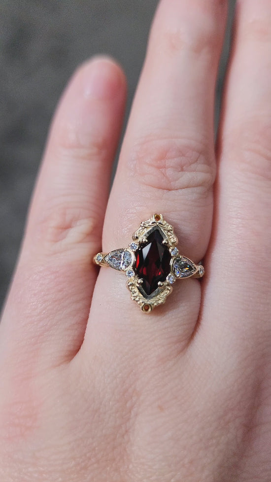 Load and play video in Gallery viewer, Red Garnet Odette antique styled engagement ring gold details gothic wedding ceremonial jewelry 
