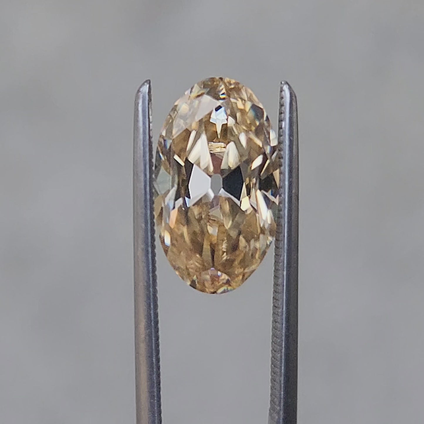 Load and play video in Gallery viewer, 2.25ct oval old mine cut champagne moissanite
