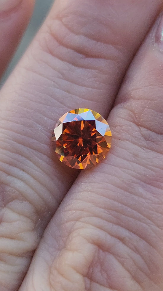 Load and play video in Gallery viewer, 1.90ct Round Orange Moissanite 8mm
